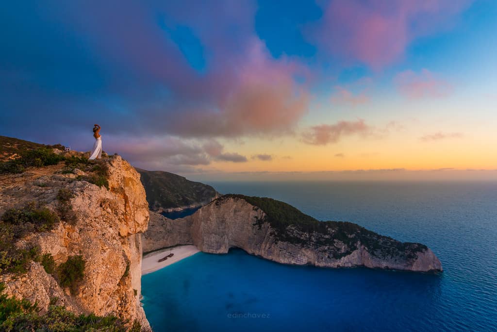Photo of girl on navagio shipwreck beach