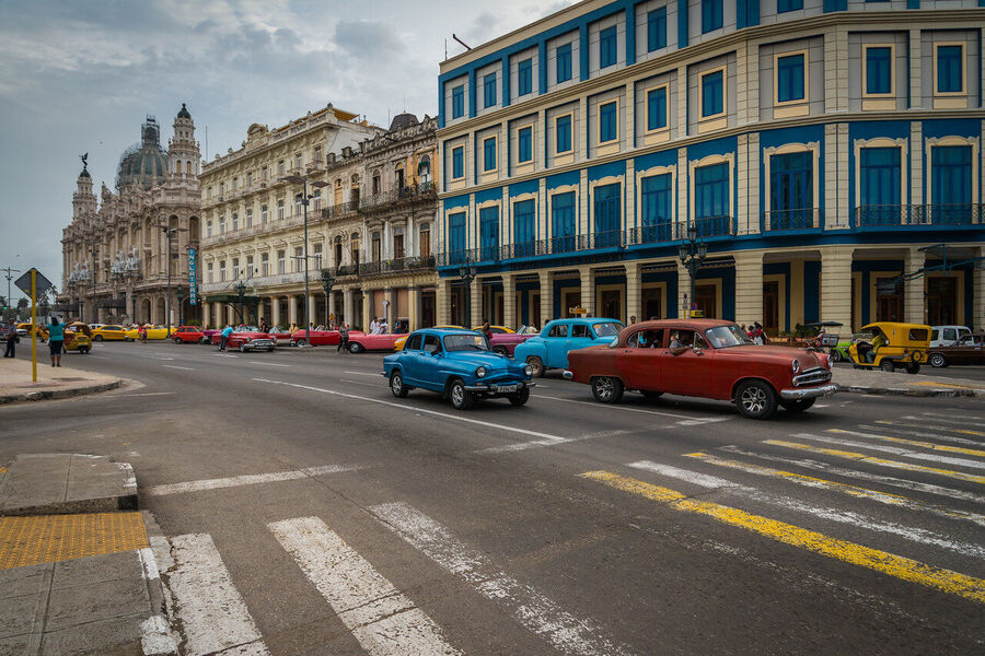 Large format fine art photograph of Old Havana rooftops under a dramatic evening sky, a cityscape unchanged since the 1950s