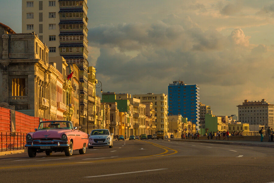 Large format fine art photograph of Old Havana rooftops under a dramatic evening sky, a cityscape unchanged since the 1950s