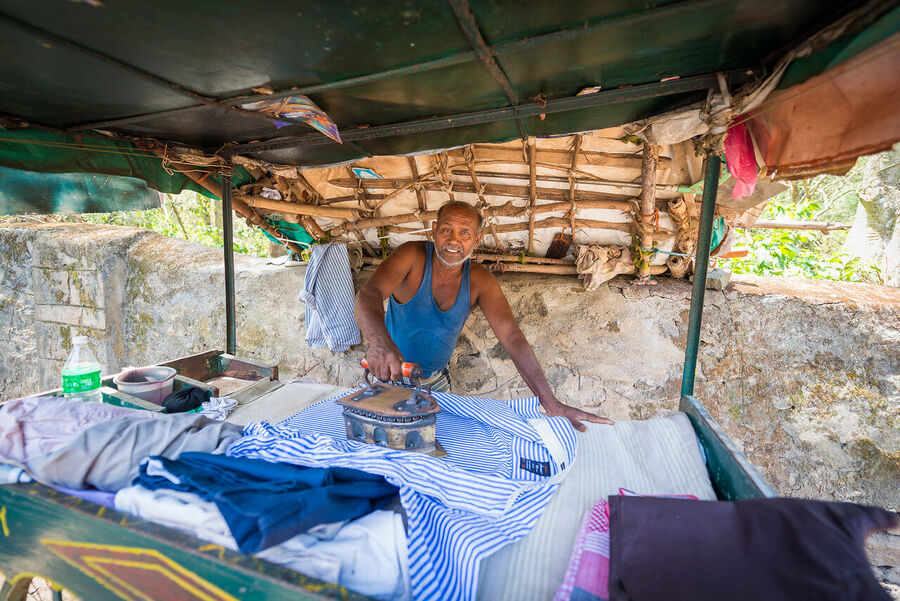 Fine art documentary print of an Indian village elder, quiet dignity and a lifetime of experience visible in a perfectly composed environmental portrait