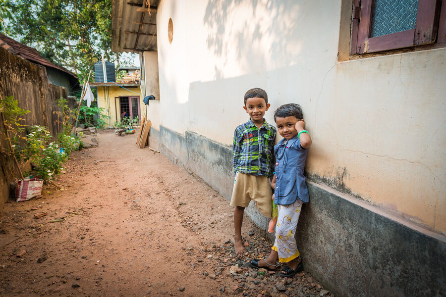 Fine art street photography print from Kerala's backwaters, everyday life along the water channels captured with warmth and compositional precision