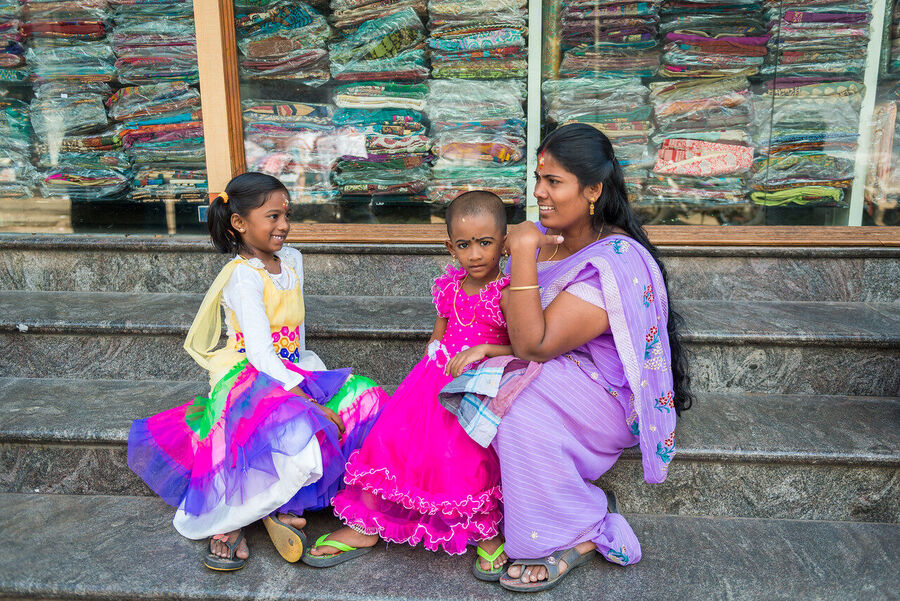 Fine art street photography print from Kerala's backwaters, everyday life along the water channels captured with warmth and compositional precision