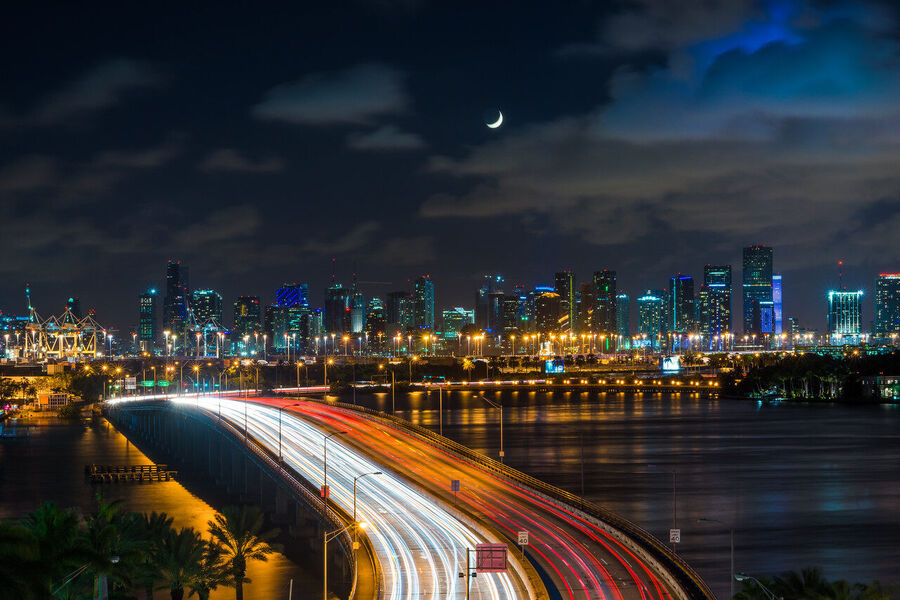 Large format fine art cityscape photograph of Brickell and downtown Miami towers illuminated against a deep blue pre-dawn sky