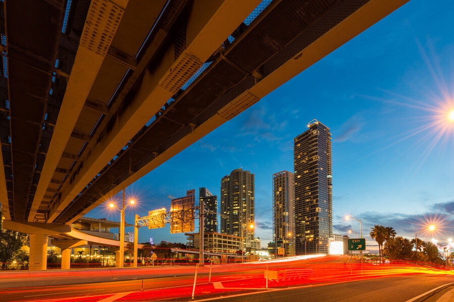 Large format fine art cityscape photograph of Brickell and downtown Miami towers illuminated against a deep blue pre-dawn sky