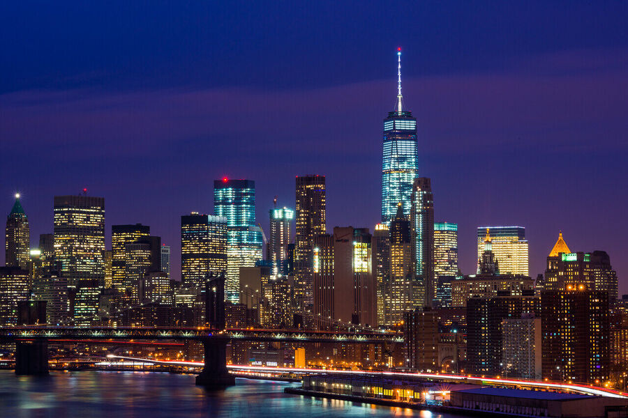 Fine art cityscape print of the Chrysler Building at dusk, Art Deco stainless steel crown catching the last warm light above the city grid